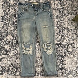 Women's Distressed Blue Jeans